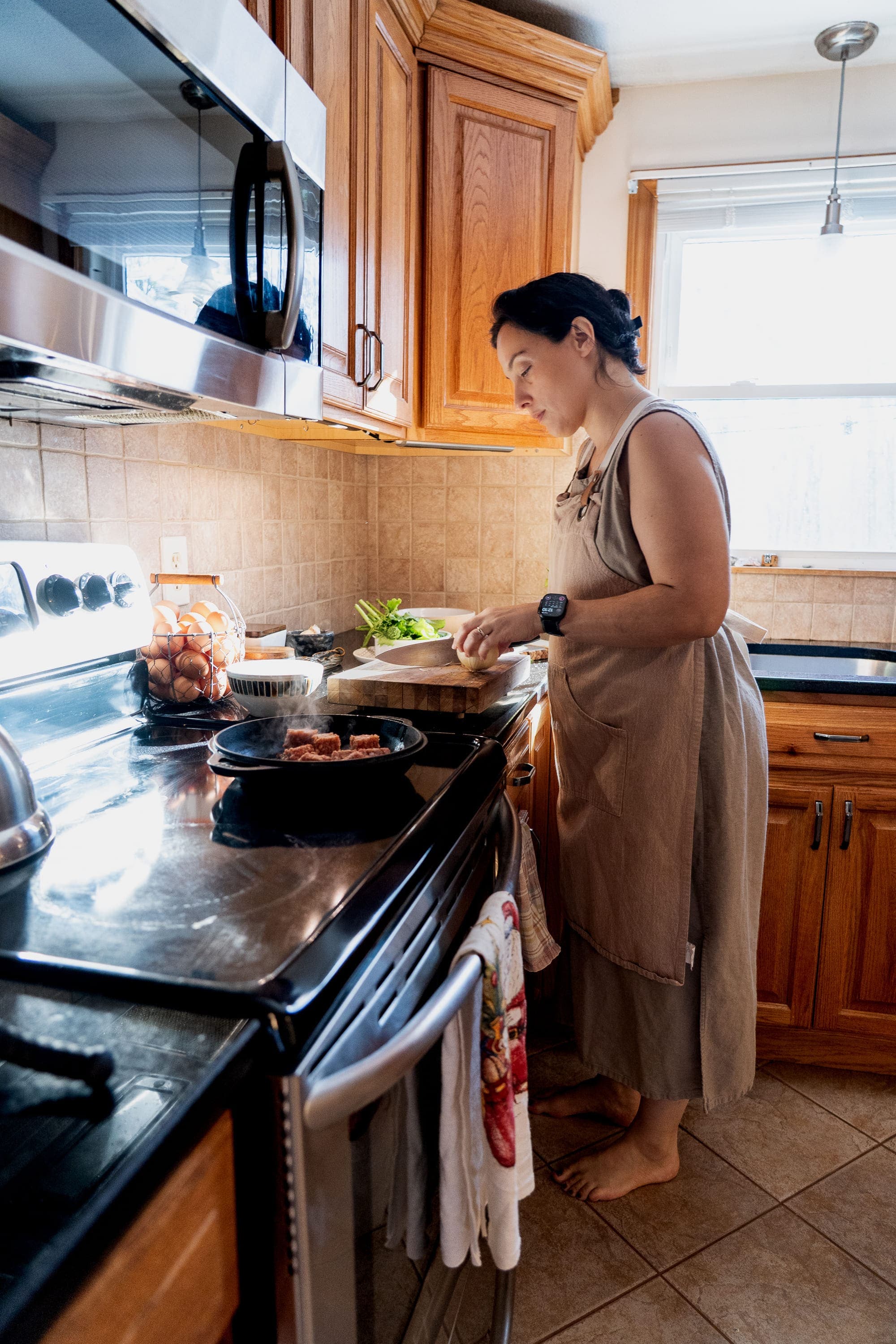 Doula preparing a nourishing meal in the kitchen