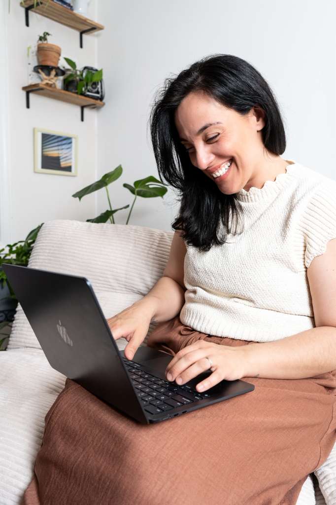 Doula providing virtual support on her laptop